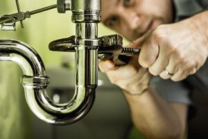 w.h. winegar repairing a dripping faucet
